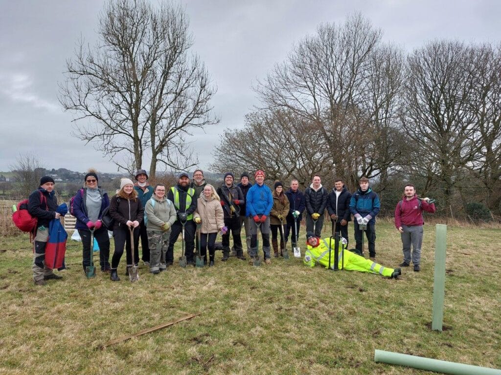 A team from our corporate supporter Glasdon taking some time out to plant trees for Lancashire Woodland Connect